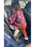 Bébé portant CHO Poncho approuvé par Securange