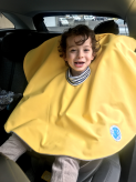 Poncho de voiture pour bébé, sécurisé et confortable. Made in France.