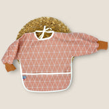 Bavoir à manches imperméable triangles