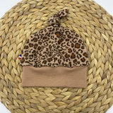 Bonnet à nœud bébé en tissu côtelé léopard