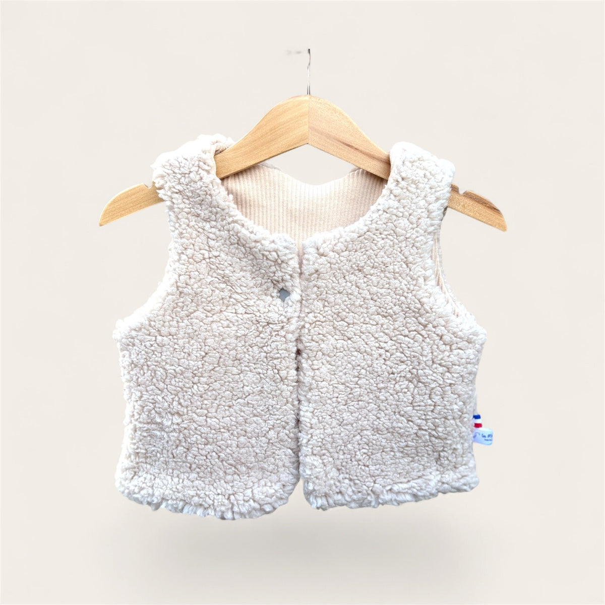 Gilet de berger sans manches bébé en fausse fourrure